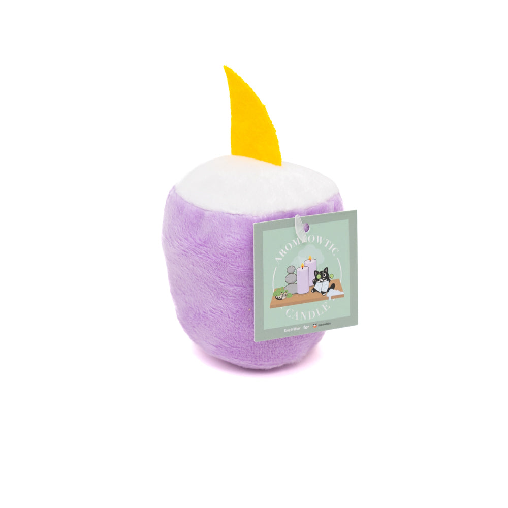 plush cat top in the shape of a candle